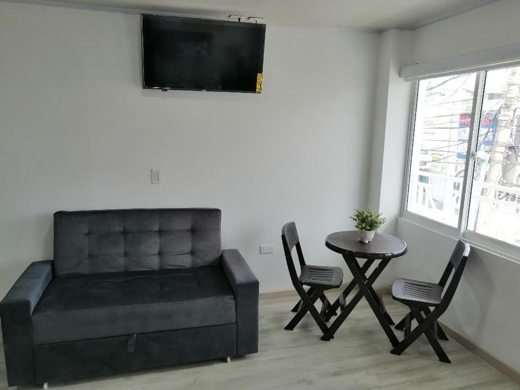 Posezení v ubytování Hostal Raatid Manchy