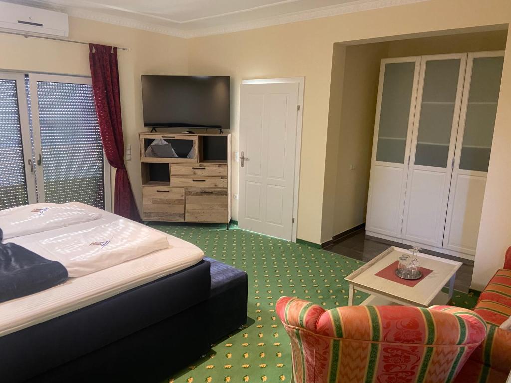 Postel nebo postele na pokoji v ubytování Hotel Restaurant Hesch