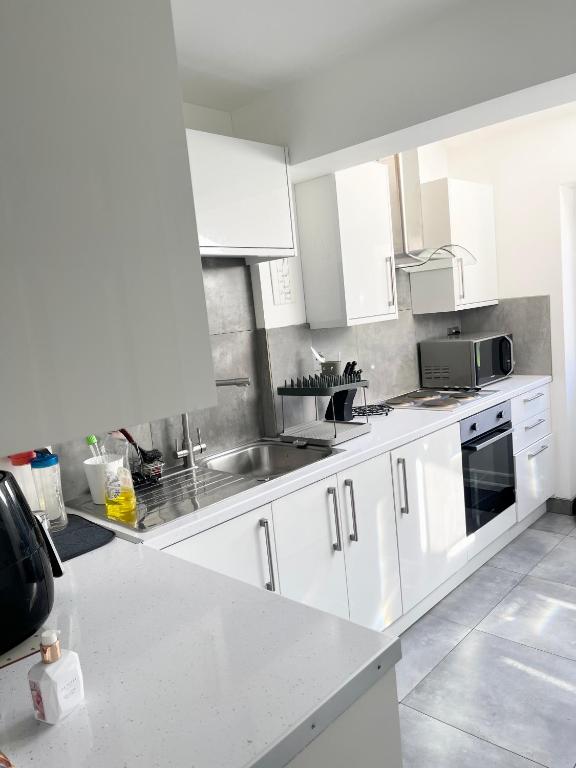 Kuchyň nebo kuchyňský kout v ubytování ANGIE HOME