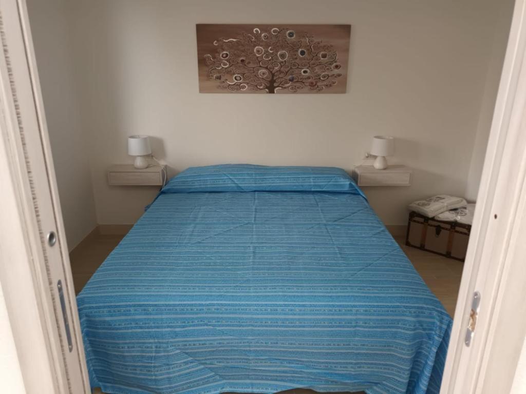 Postel nebo postele na pokoji v ubytování La Fenice