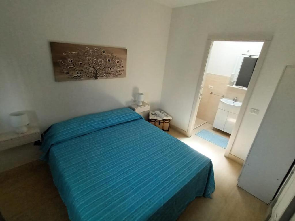 Postel nebo postele na pokoji v ubytování La Fenice