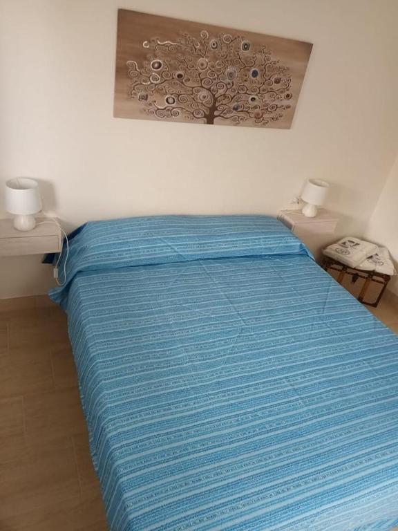 Postel nebo postele na pokoji v ubytování La Fenice