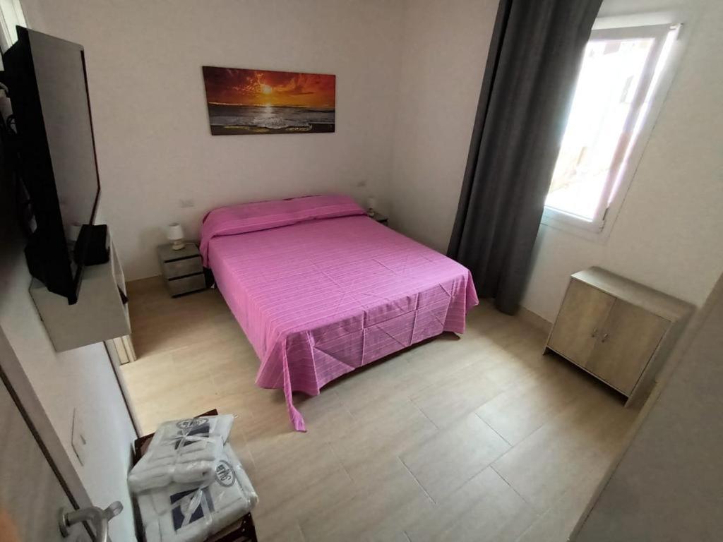 Postel nebo postele na pokoji v ubytování La Fenice