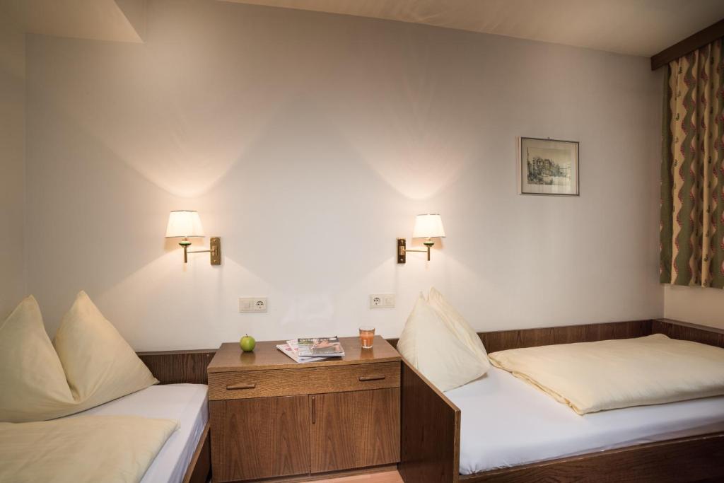 Posteľ alebo postele v izbe v ubytovaní Appartementhaus Gastein inklusive Alpentherme gratis