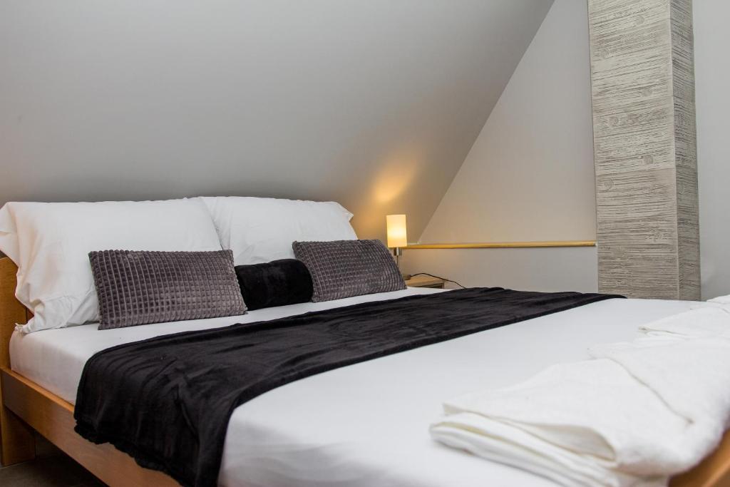 Krevet ili kreveti u jedinici u okviru objekta Feher Akac Guest House