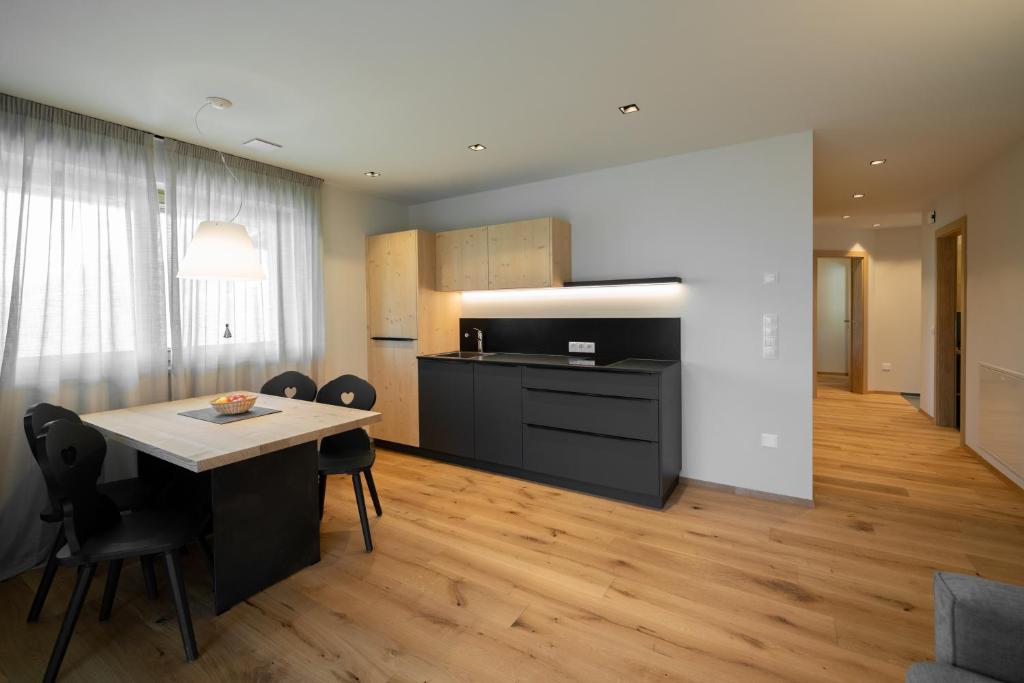Kuchyň nebo kuchyňský kout v ubytování Oberzerod Apartments