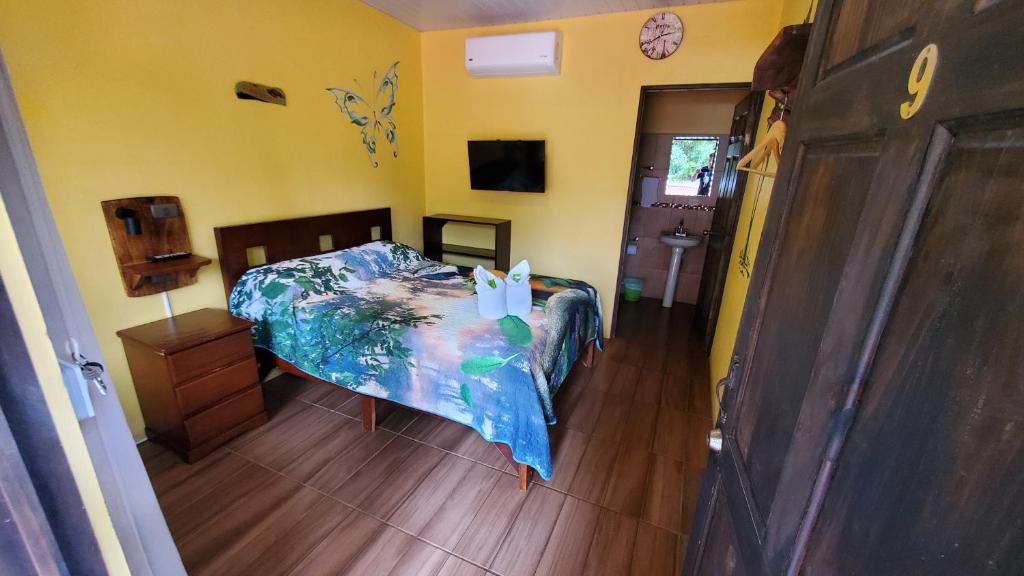 Postel nebo postele na pokoji v ubytování Tropical Beach