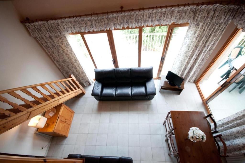 Posedenie v ubytovaní Apartamentos Siglo XXI - Ancla