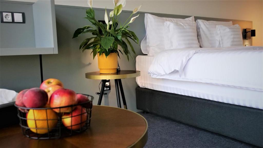 Postel nebo postele na pokoji v ubytování WERK Hotel & SPA