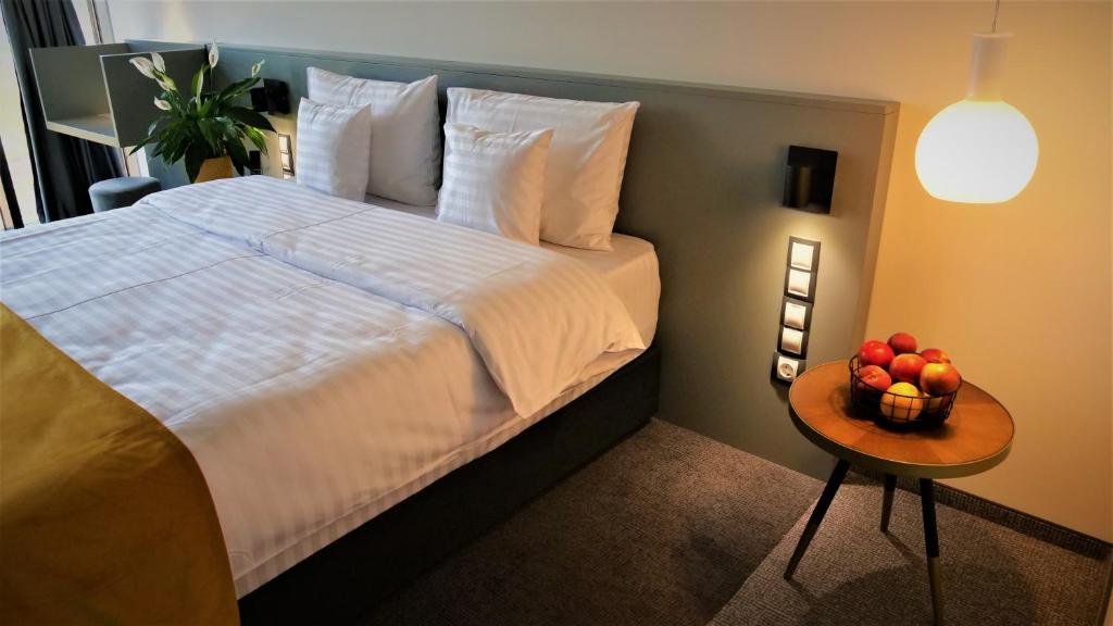 Postel nebo postele na pokoji v ubytování WERK Hotel & SPA