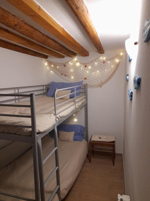 Postel nebo postele na pokoji v ubytování Vacanze tra Calli&Campielli a Chioggia