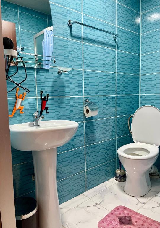 Koupelna v ubytování Hotel Maria