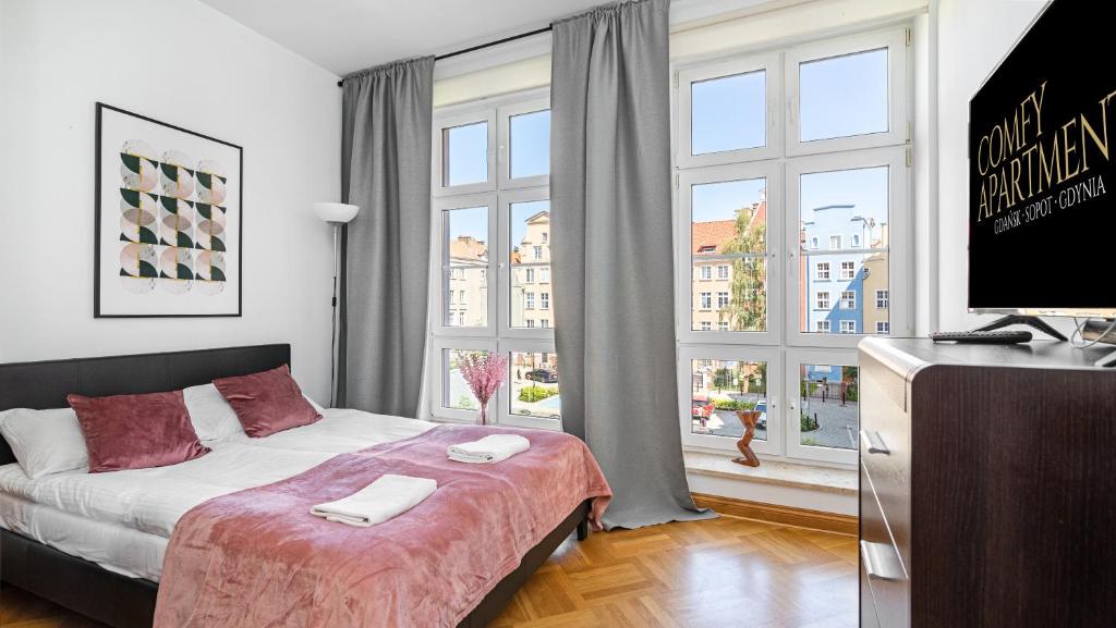 Posteľ alebo postele v izbe v ubytovaní Old Town Center - Przy Deptaku