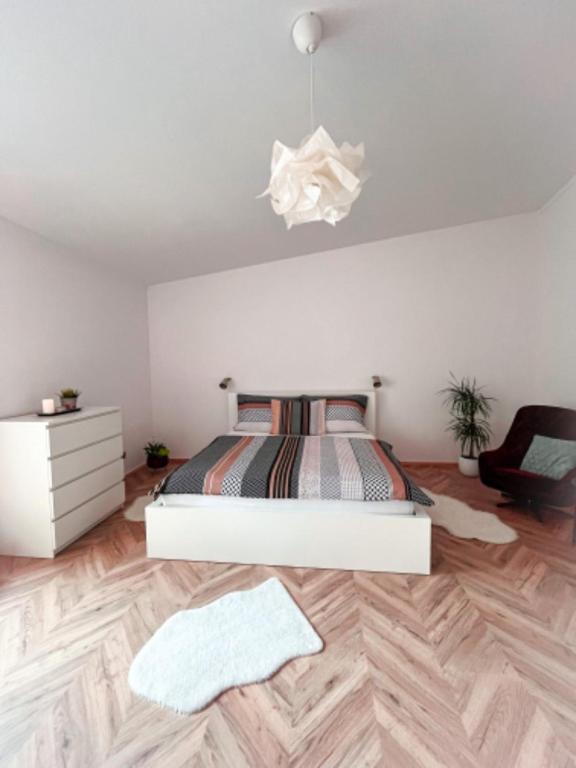 Postel nebo postele na pokoji v ubytování Apartmán NIKLAN