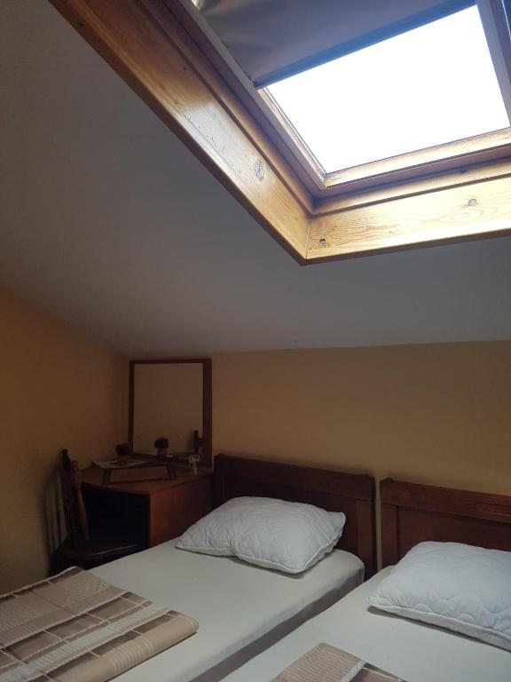 Postel nebo postele na pokoji v ubytování Ada Apartments