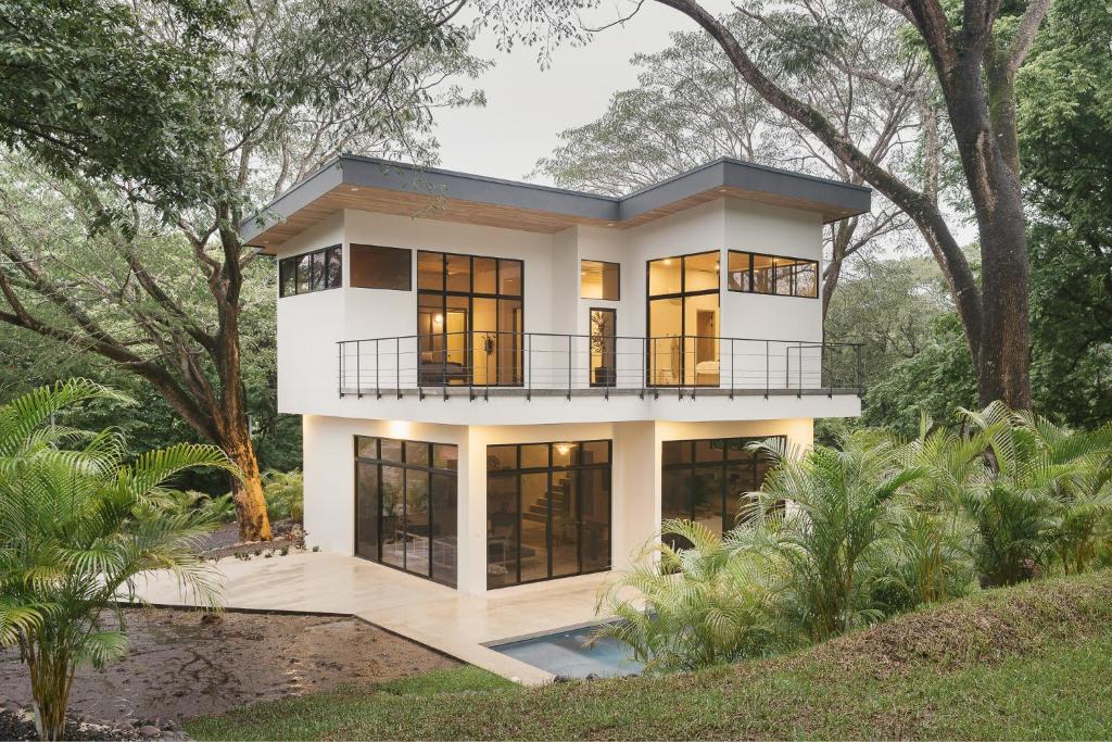 a house in the middle of a forest at Casa Arcilla NEW LISTING in Nosara