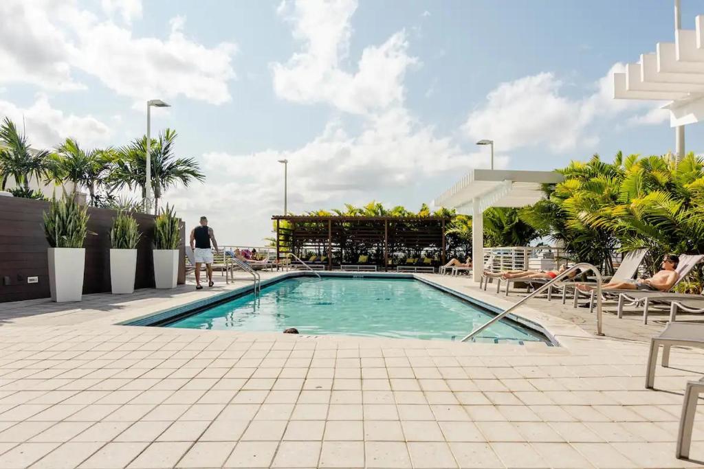 The swimming pool at or close to Midtwon Miami Wynwood Condo