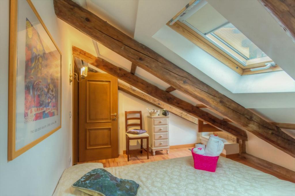 Postel nebo postele na pokoji v ubytování Residenza de l'Osmarin Suites