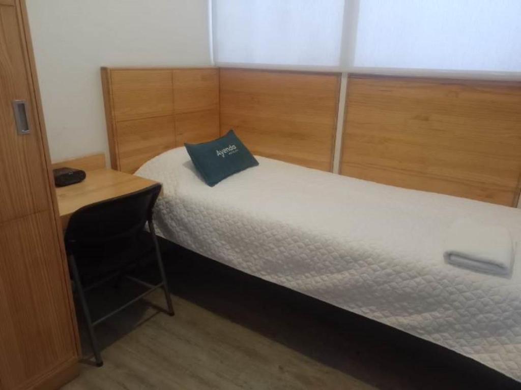 Postel nebo postele na pokoji v ubytování Ayenda 1043 Kafir