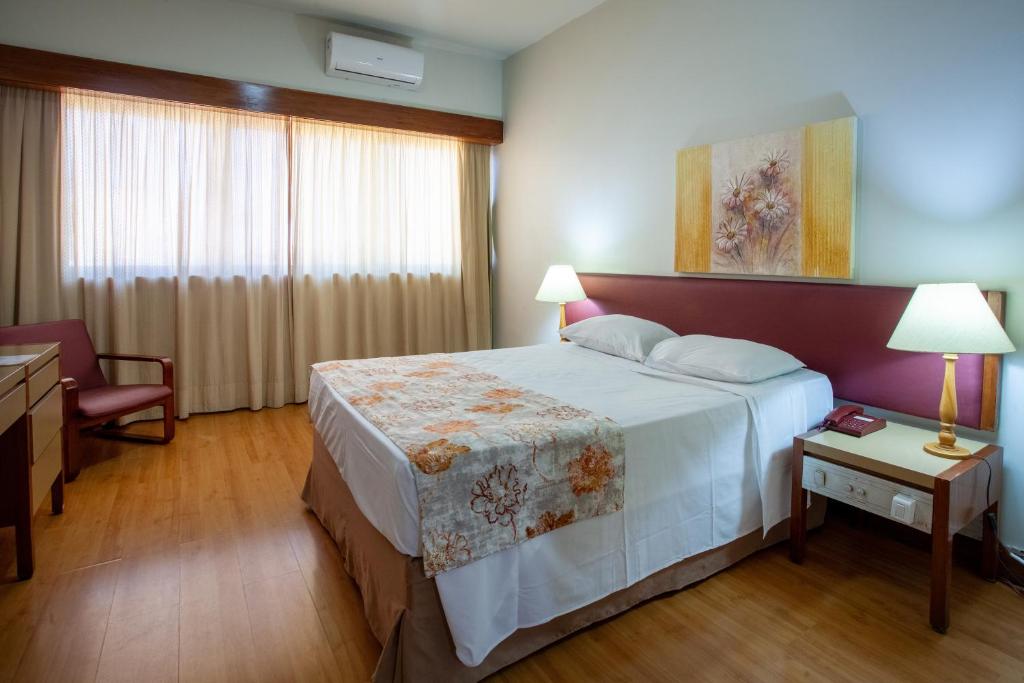 Tempat tidur dalam kamar di Hotel Nacional Inn Belo Horizonte