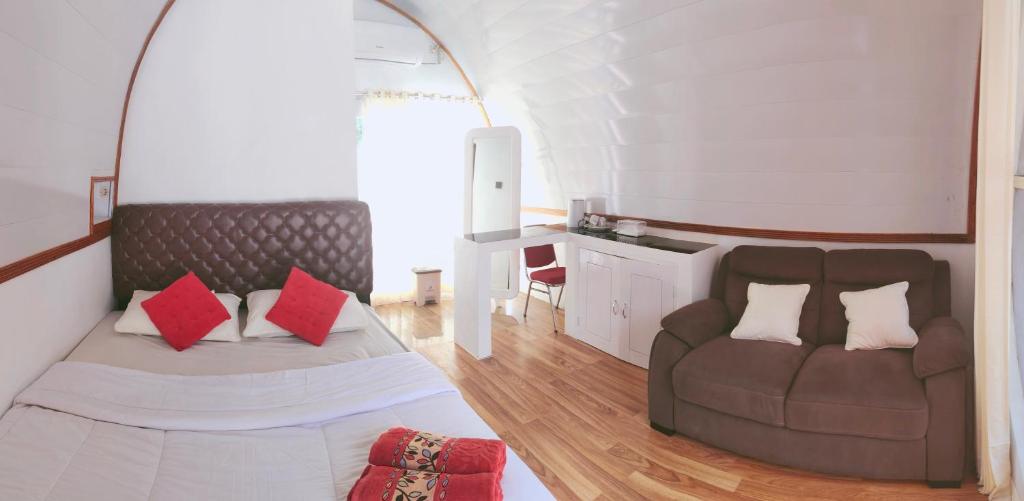 Postel nebo postele na pokoji v ubytování Mercy Cottage