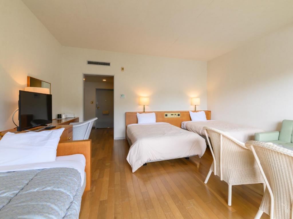 Postel nebo postele na pokoji v ubytování Tabist Villa Daio Resort Ise-Shima