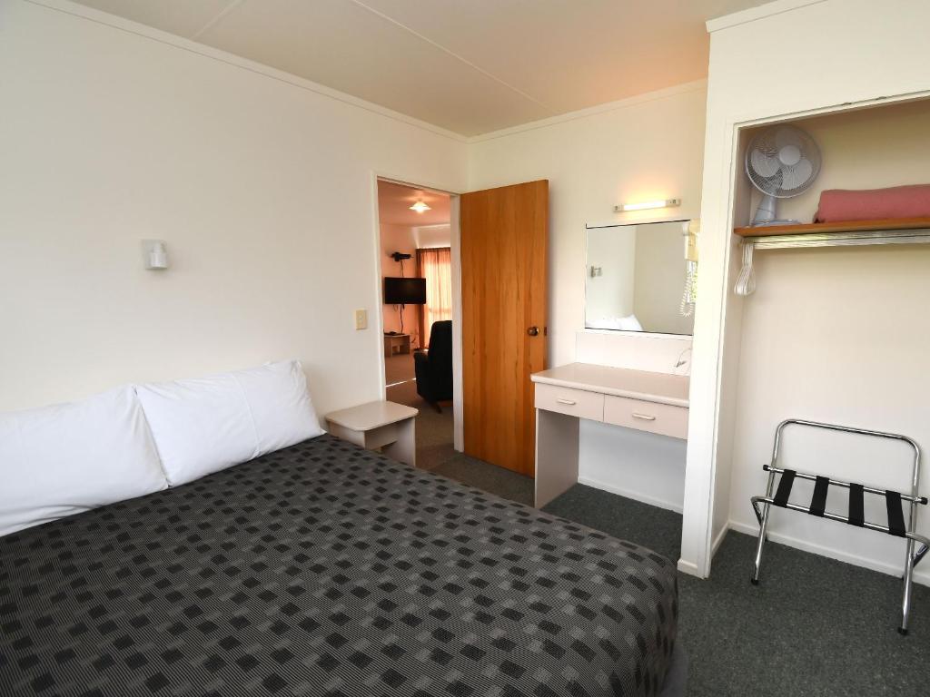 Postel nebo postele na pokoji v ubytování Avon Motel