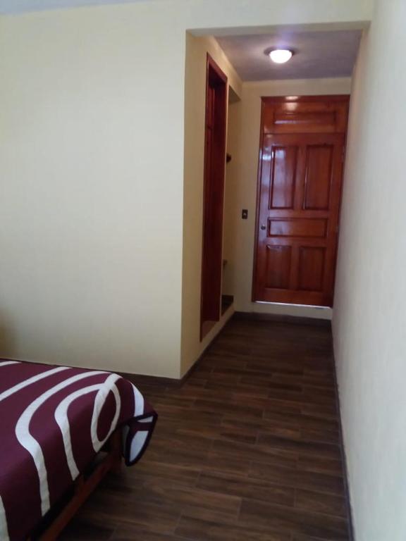 Postel nebo postele na pokoji v ubytování HOTEL RESTAURANT LOS PRISMAS
