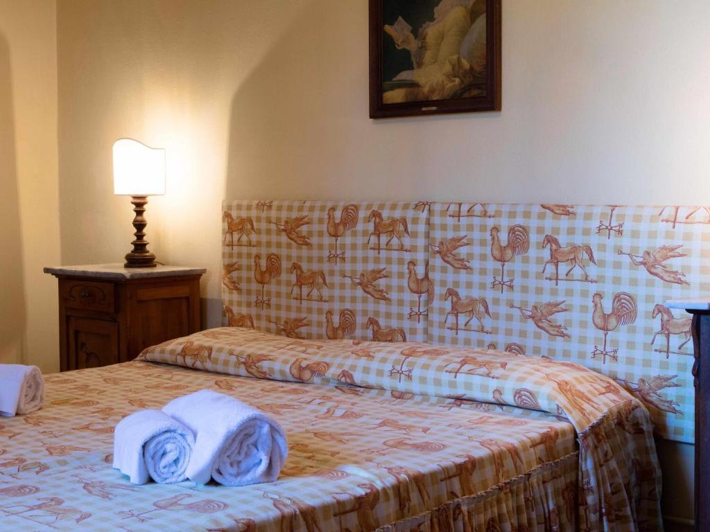 Posteľ alebo postele v izbe v ubytovaní Belvilla by Oyo Casa Prati