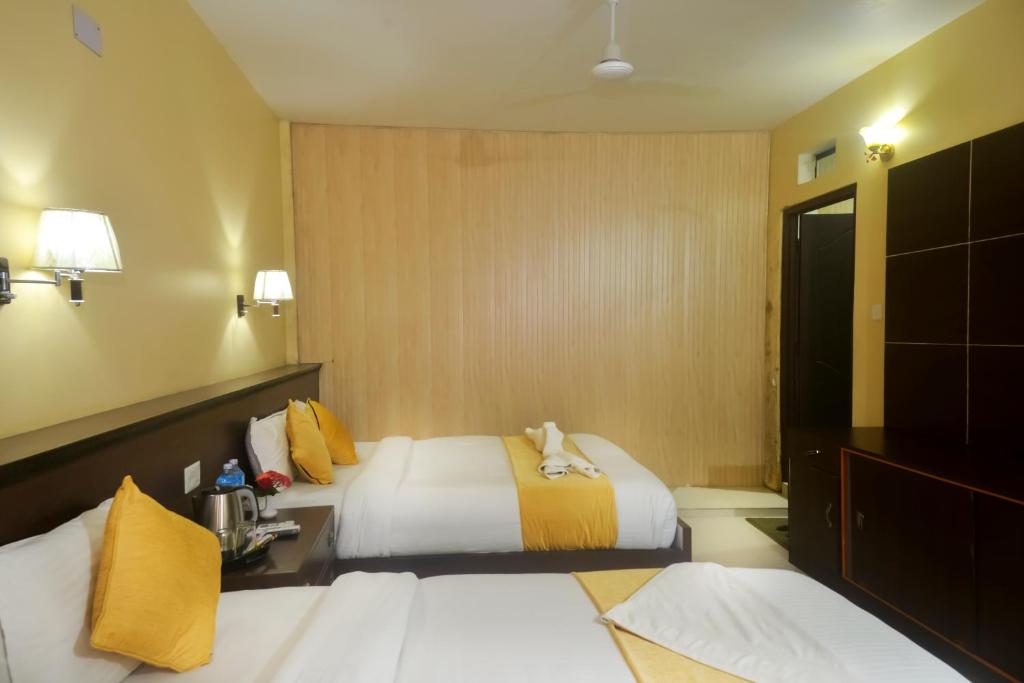 Letto o letti in una camera di Hotel Rainforest
