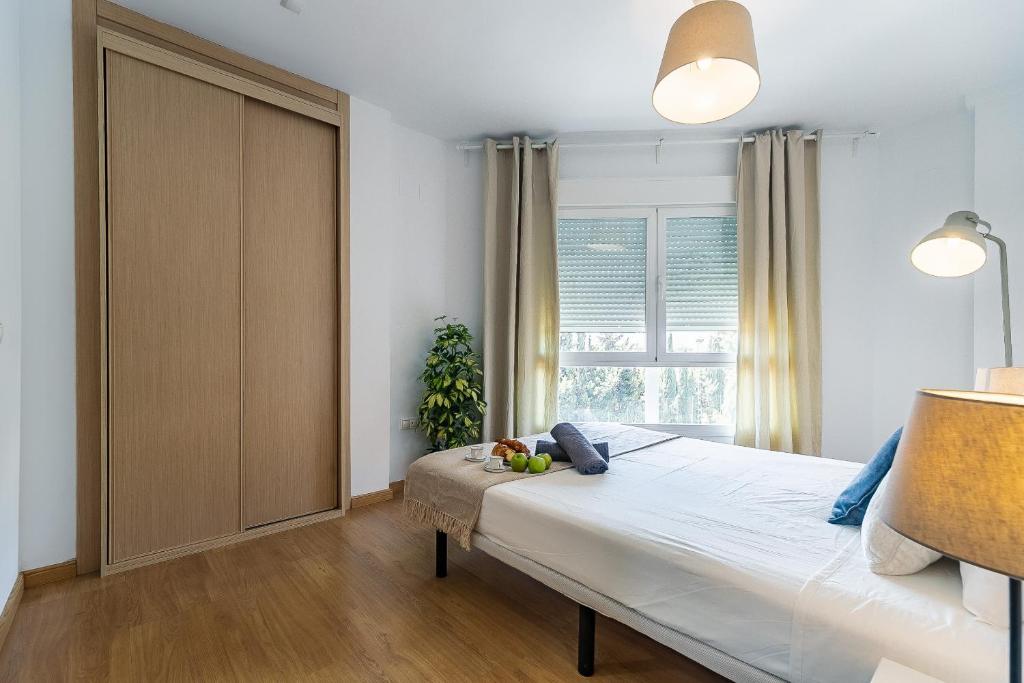 Posteľ alebo postele v izbe v ubytovaní Modern Beach Apartment Valparaiso with Parking