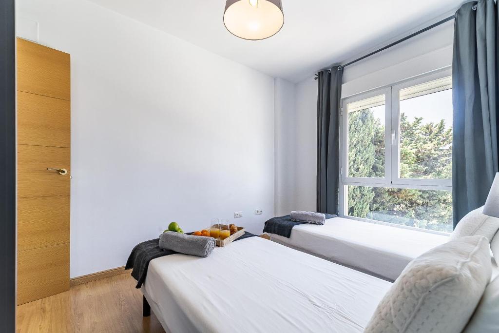 Posteľ alebo postele v izbe v ubytovaní Modern Beach Apartment Valparaiso with Parking