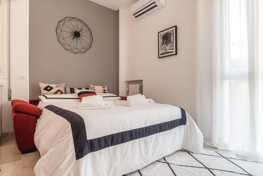 Posteľ alebo postele v izbe v ubytovaní Grey House in the heart of @Treviso