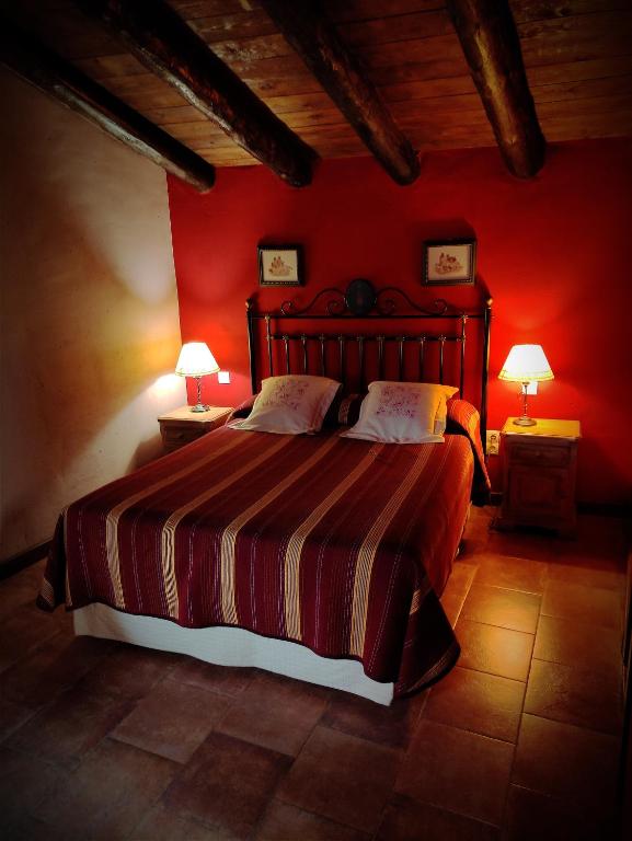 Postel nebo postele na pokoji v ubytování Hotel Albarrán