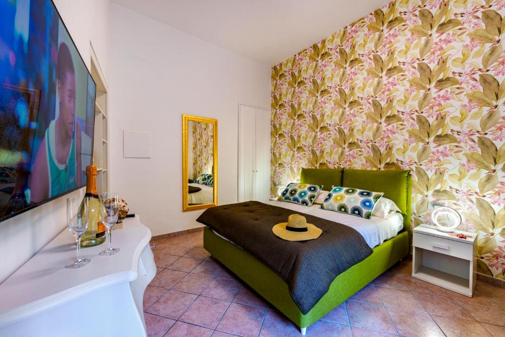 Postel nebo postele na pokoji v ubytování Vallone dei Mulini Suite