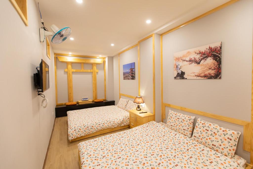 Giường trong phòng chung tại Nguyễn Tài Hostel &amp; Coffee Đà Lạt