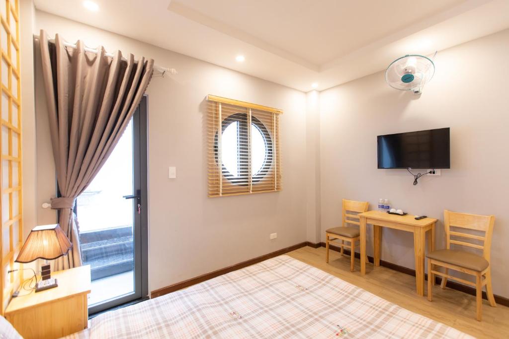 TV/trung tâm giải trí tại Nguyễn Tài Hostel &amp; Coffee Đà Lạt