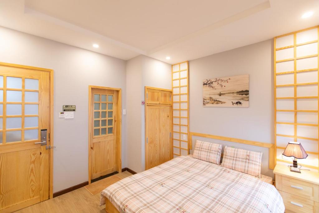 Giường trong phòng chung tại Nguyễn Tài Hostel &amp; Coffee Đà Lạt