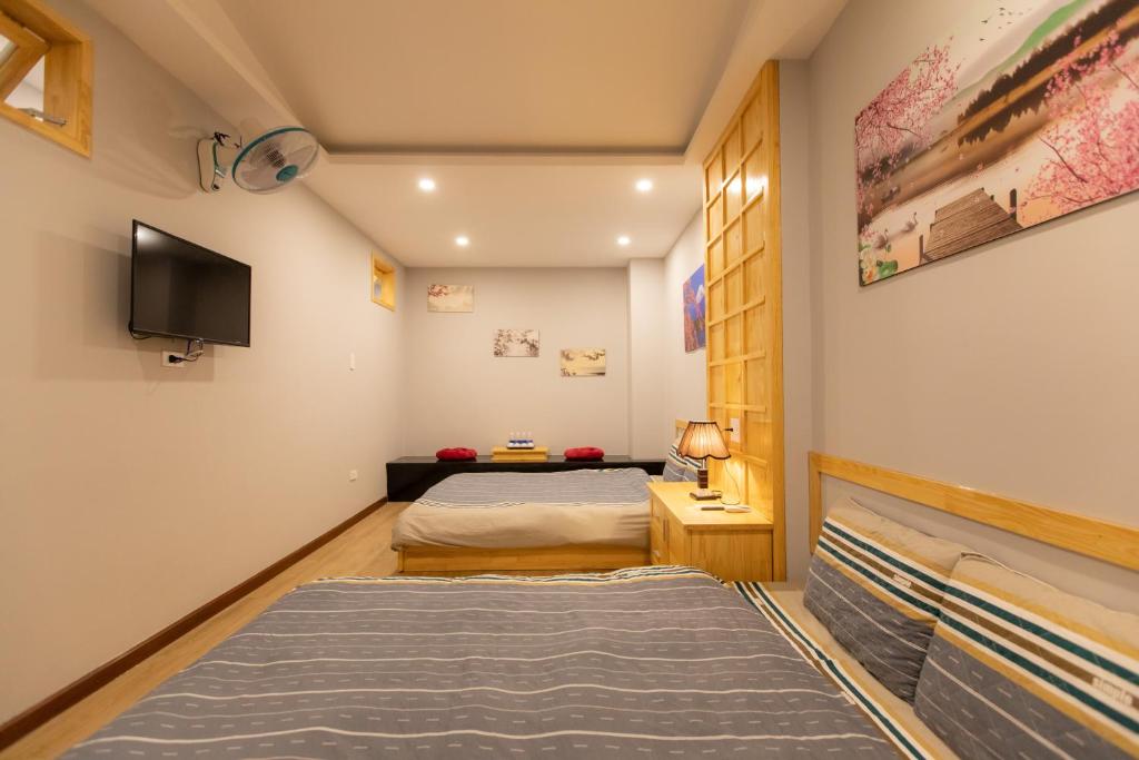 TV/trung tâm giải trí tại Nguyễn Tài Hostel &amp; Coffee Đà Lạt