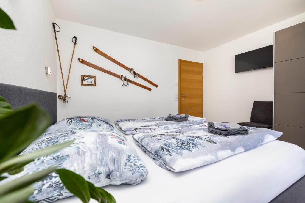 Posteľ alebo postele v izbe v ubytovaní Fischis Alpen Appartements