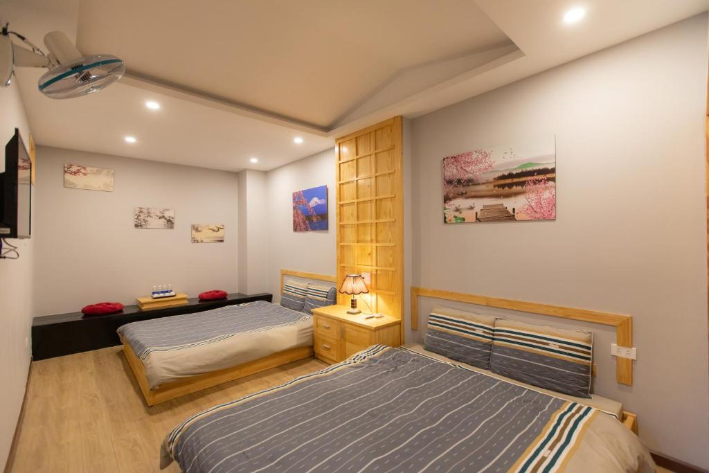 Giường trong phòng chung tại Nguyễn Tài Hostel &amp; Coffee Đà Lạt