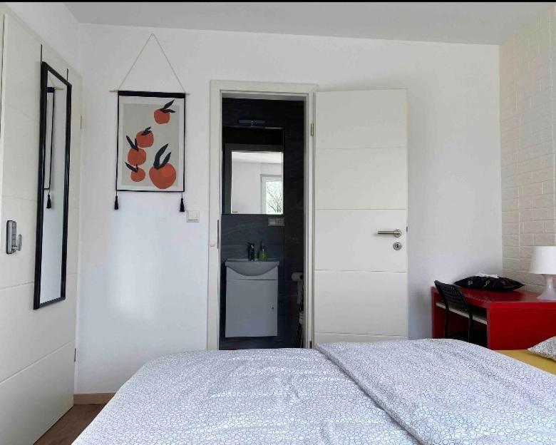 Postel nebo postele na pokoji v ubytování Apartment CHEZ TONY