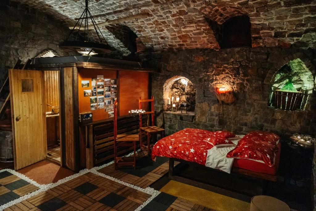 Postel nebo postele na pokoji v ubytování Krasberry Ježev brlog