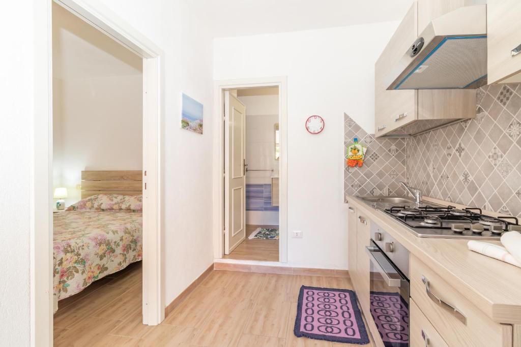 A kitchen or kitchenette at Sea Shell Isola Rossa