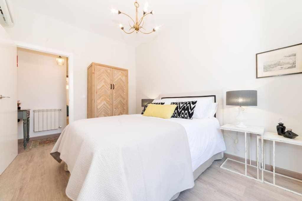 Postel nebo postele na pokoji v ubytování Room Boutique Calma Nerea By KubiK
