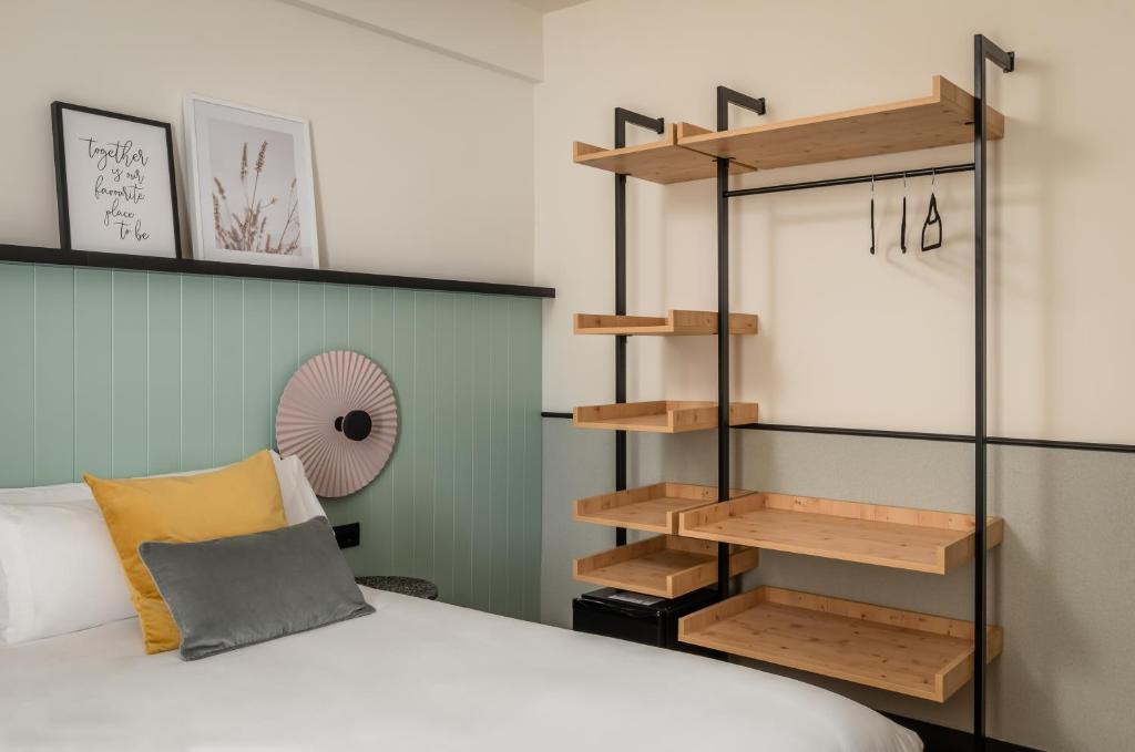 Postel nebo postele na pokoji v ubytování BYPILLOW Irala