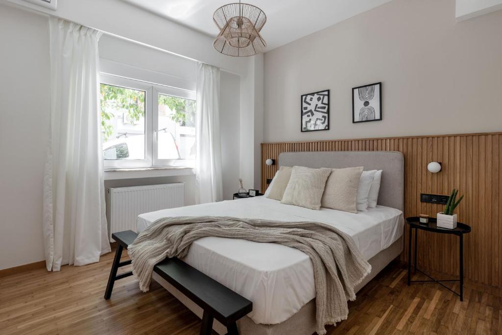Posteľ alebo postele v izbe v ubytovaní Dreamy 1BR Apartment in Kolonaki by UPSTREET