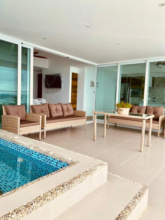 Bazén v ubytování Resort Playa Azul Departamentos nebo v jeho okolí