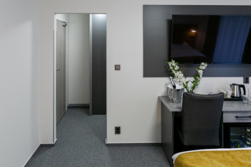 TV a/nebo společenská místnost v ubytování Wellness Hotel Edelweiss