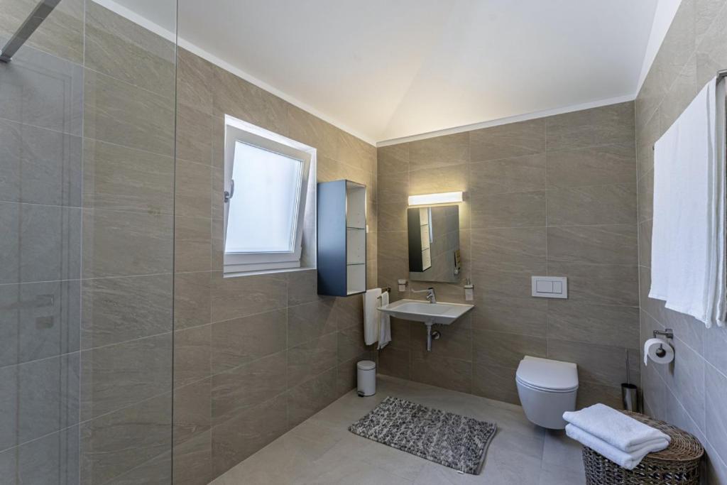 Kúpeľňa v ubytovaní Villa Vera in Ližnjan - Haus für 8 Personen